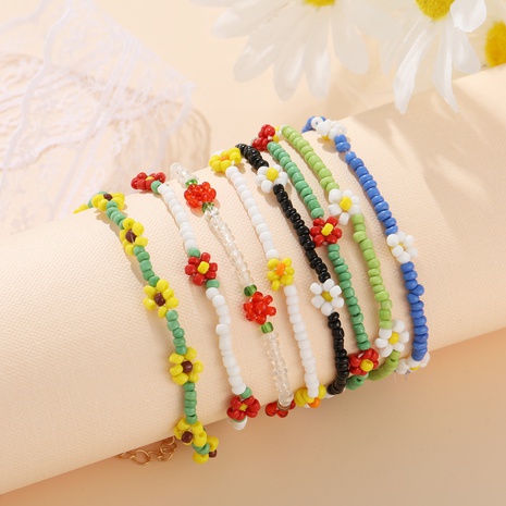 simple temperament clashing color flower rice beads elastic rope beaded bracelet's discount tags