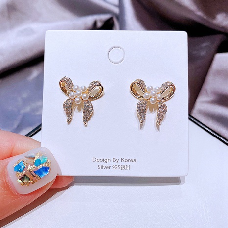 fashion rice beads zircon micro-inlaid bow-knot copper earrings  NHCG511856's discount tags