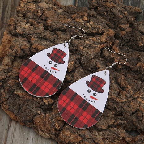 Boucles d'oreilles en cuir de bonhomme de neige double face en cuir de treillis rouge en forme de goutte de Noël en gros's discount tags