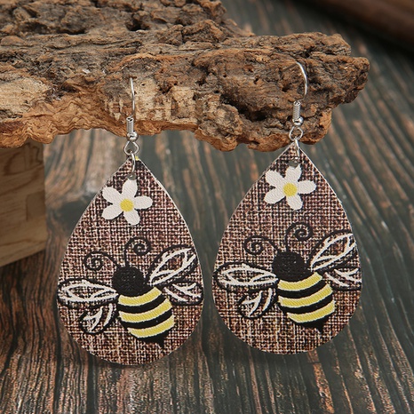 nouveau style ethnique en forme de goutte de petites boucles d'oreilles fleur d'abeille en gros's discount tags