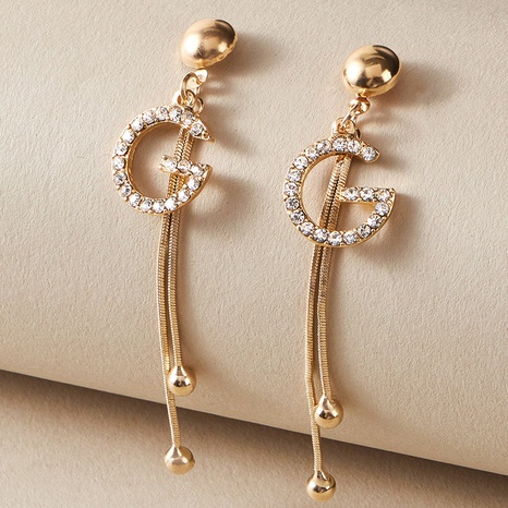 romantic rhinestone studded diamond letter G earrings's discount tags