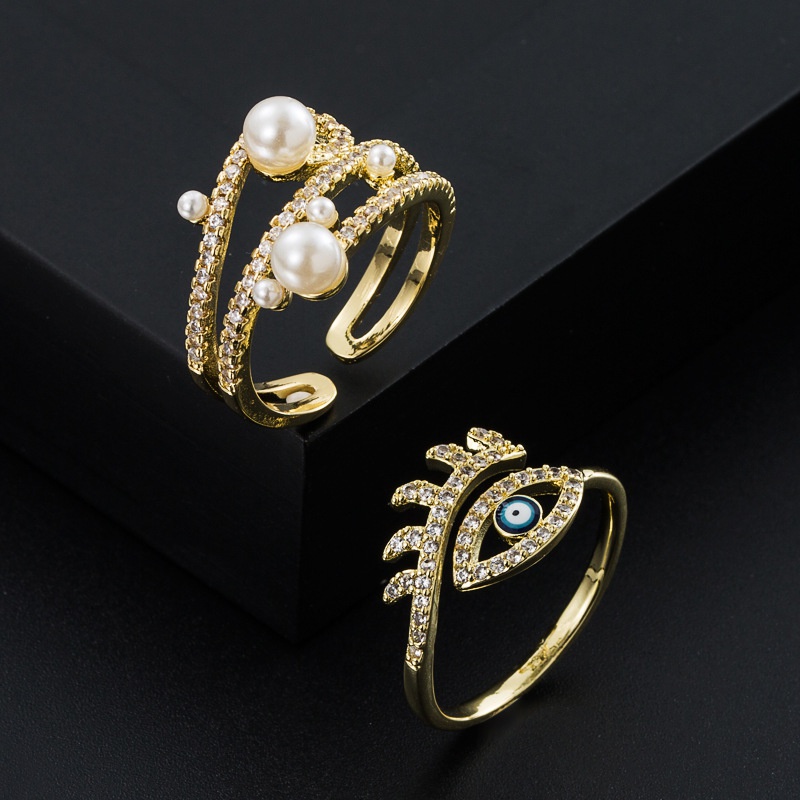 European and American fashion copperplated goldplated microinlaid zircon eyes pearl ring
