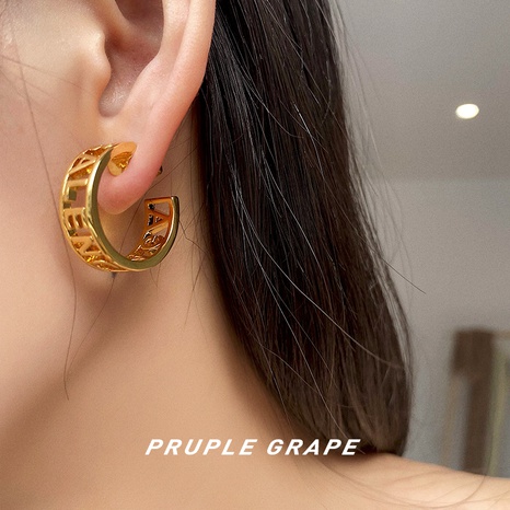 Paris hollow letter semicircle design styling c-shaped earrings's discount tags