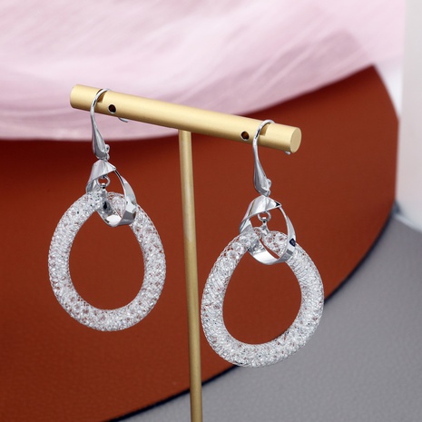 Fashionable French style thin water shape hollow earrings's discount tags