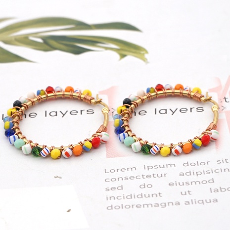 Bohemian clashing color beads hoop earrings's discount tags
