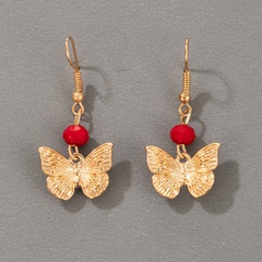 bijoux de style ethnique papillon doré boucles d'oreilles irrégulières perlées géométriques