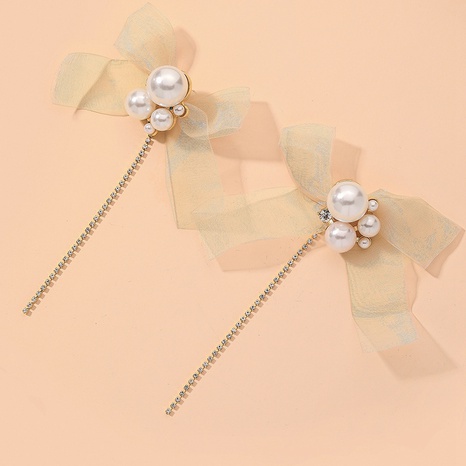 pearl bow net yarn earrings's discount tags