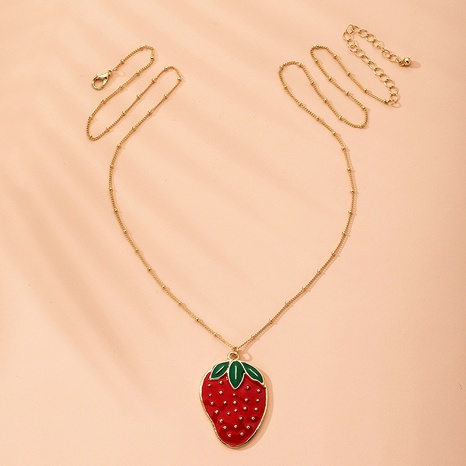 collier simple fraise's discount tags