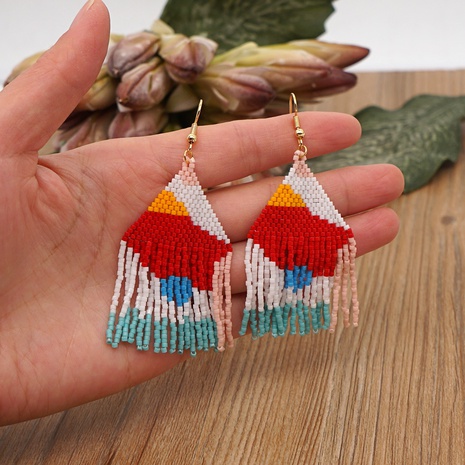 simple bohemian style handmade beaded tassel earrings's discount tags
