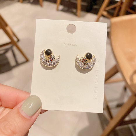 wholesale Boucles d'oreilles astronautes coréennes micro-incrustées de zircon's discount tags