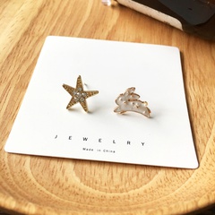 Fashion bunny asymmetric shiny star diamond alloy earrings wholesale