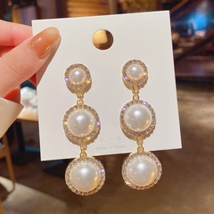 Fashion circle pearl tassel copper earrings wholesale