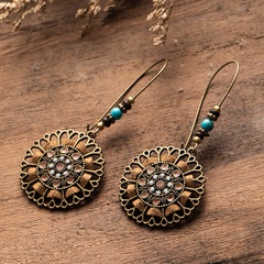 retro round hollow carved earrings