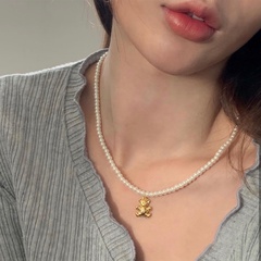 Korea golden bear pearl alloy necklace wholesale