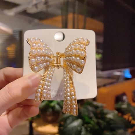 Haarnadelklammer imitierte Perlenschleife im koreanischen Stil's discount tags