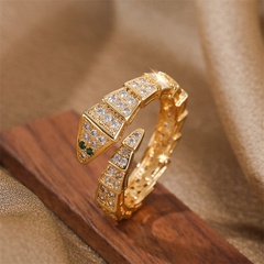 Simple gold electroplated copper inlaid zirconium snake open ring