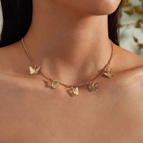 collier pendentif mutiple papillon doré's discount tags