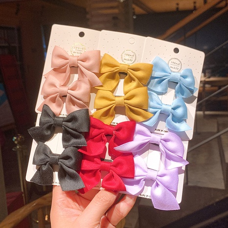 Einfarbige Kinderbogen-Haarnadel im koreanischen Stil's discount tags