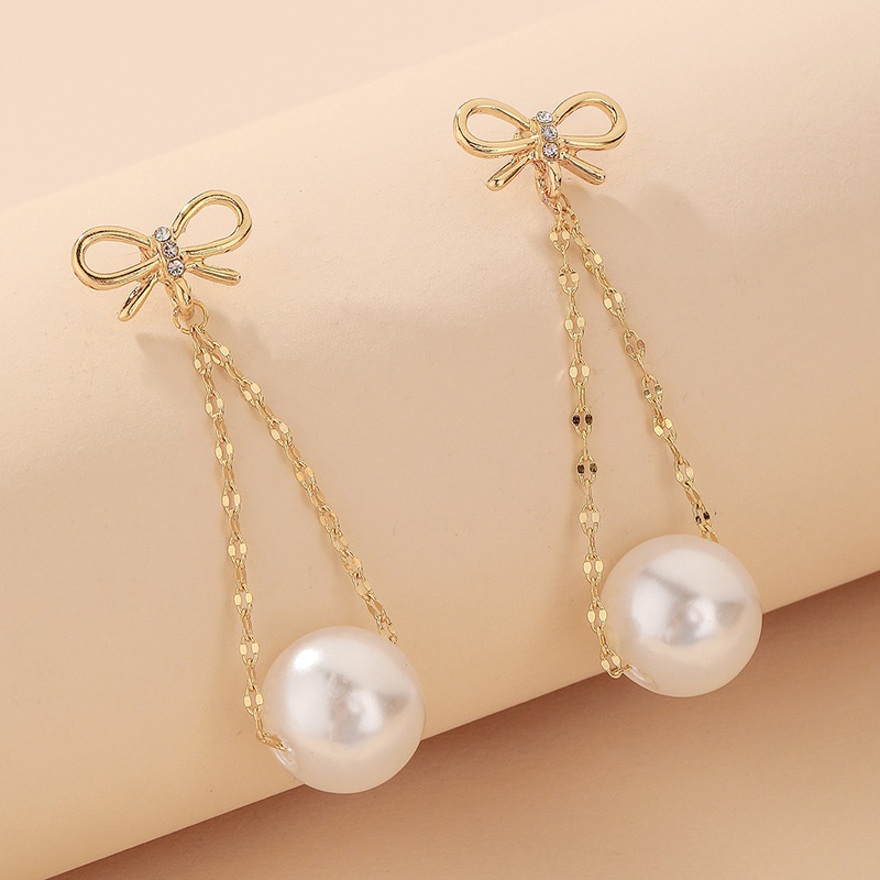 Korean style pearl inlaid rhinestone bow earrings