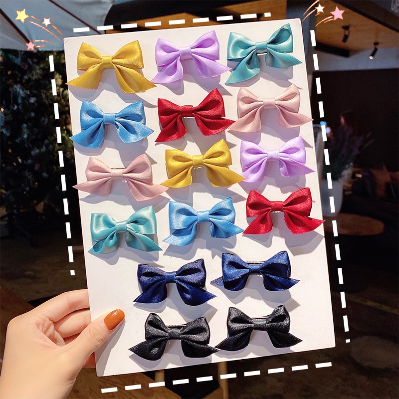 Korean solid color fabric bow hairpin wholesale