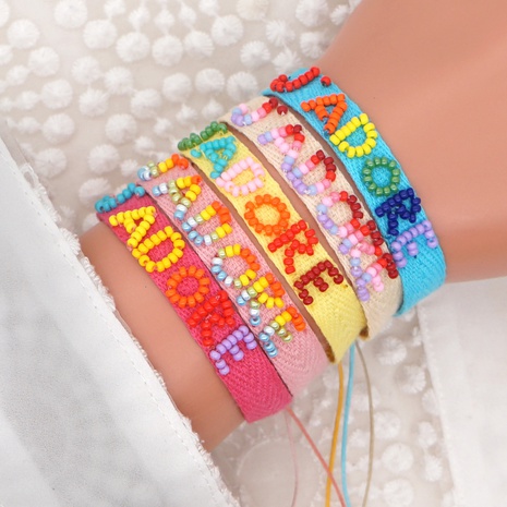 Bracelet de lettre arc-en-ciel tissé avec perles de riz et ruban de Bohème's discount tags