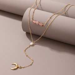 mehrschichtige Halskette mit mehrschichtigem Anhänger mit rosa Perlen und Halbmond