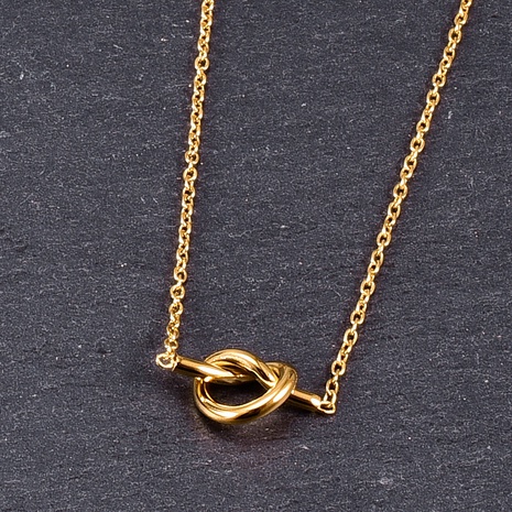 Retro Knot Hollow Heart Pendent Titanium Steel Necklace's discount tags