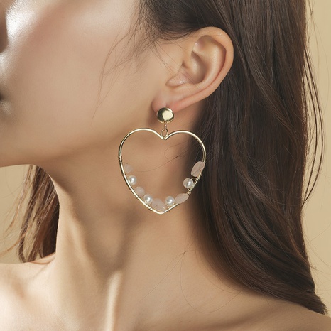 Bohemian heart natural stone pearl earrings's discount tags
