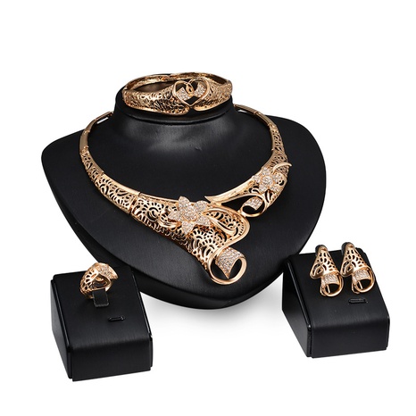 fashion geometric golden hollow twisted alloy diamond four-piece suit jewelry's discount tags