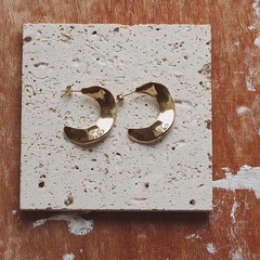 Simple horn curved piece concave-convex tin foil titanium steel earrings