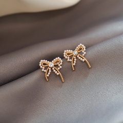 Korean style pearl bow earrings wholesale