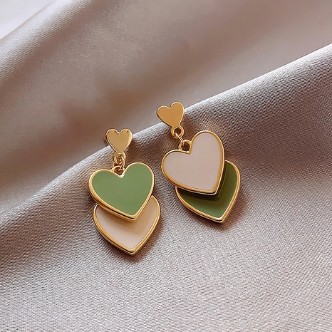 Korean style contrast color peach heart earrings's discount tags