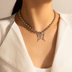 Nihaojewelry bijoux en gros argent pendentif papillon creux collier de perles