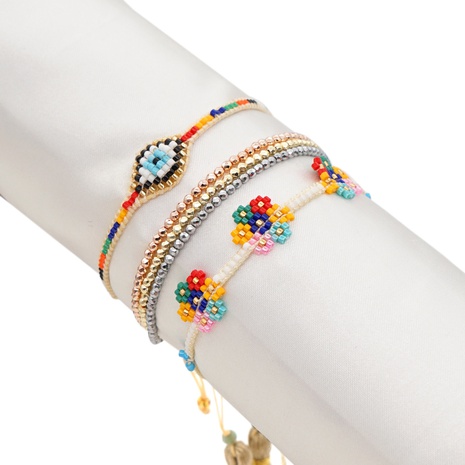fashion rose gold multi-layer lucky eyes rice bead woven bracelet set's discount tags