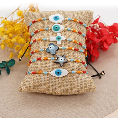 Simple natural shell lucky eyes rice beads hand-woven colorful beaded bracelet's discount tags
