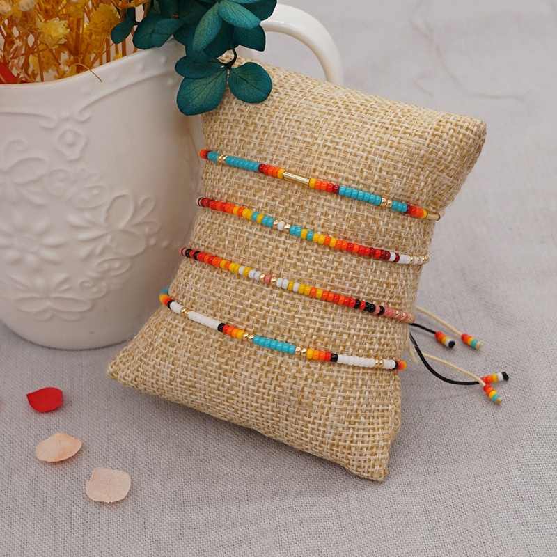 Petit bracelet de perles de riz de style ethnique simple tiss  la main de couleur arcenciel