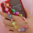 Simple ethnic smiling face woven beaded mobile phone chainpicture14