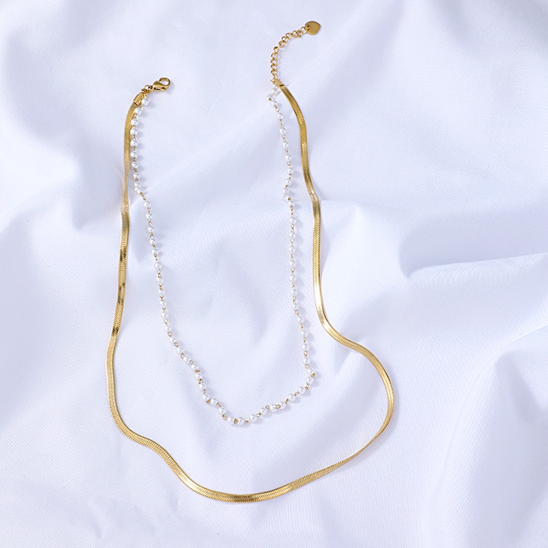 simple fashion golden double snake bone pearl necklace