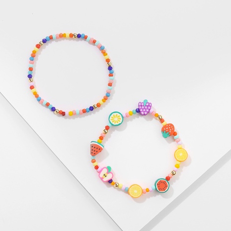 Cute Color Rice Beads Soft Pottery Fruit Beaded Bracelet Set's discount tags