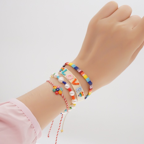 Simple ethnic Miyuki bead freshwater pearl bracelet's discount tags