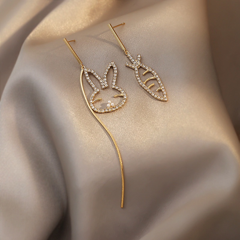cute asymmetrical golden rabbit carrot earrings
