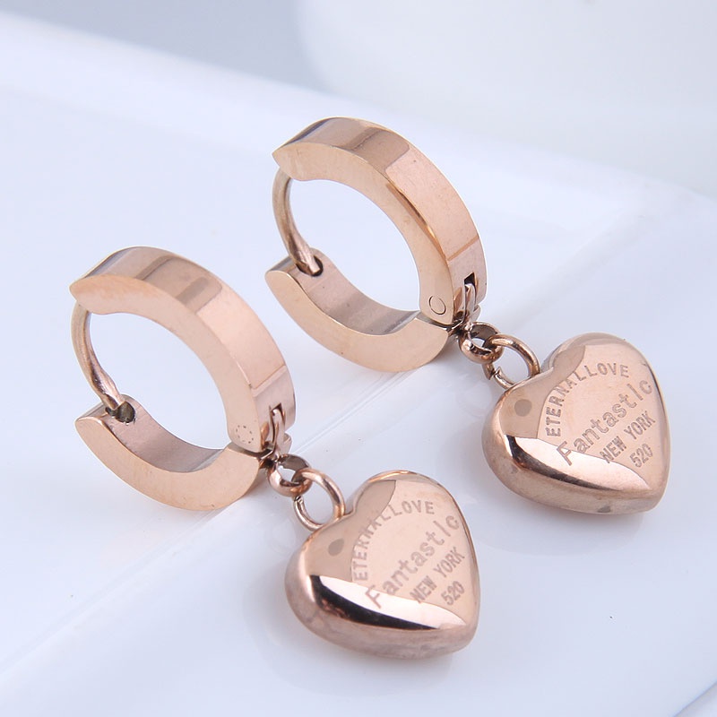 simple peach heart titanium steel earrings wholesale