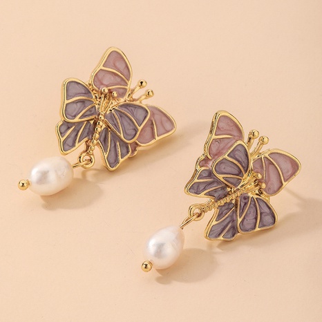 Nihaojewelry jewelry wholesale pearl butterfly contrast color earrings's discount tags