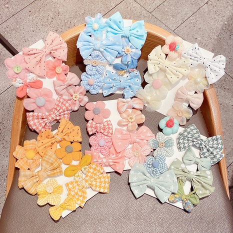 Nihaojewelry wholesale checkered dotted bow Children's cute cloth hairpin set's discount tags