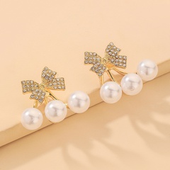 Nihaojewelry Korean Style Pearl Rhinestone Bow Earrings Wholesale Jewelry