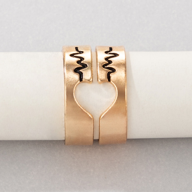 Nihaojewelry wholesale jewelry new golden ECG wave hollow heart couple ring 2piece set