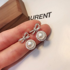 wholesale jewelry simple bow pearl alloy diamond earrings Nihaojewelry