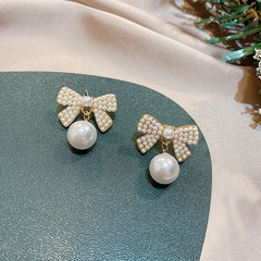 Nihaojewelry wholesale jewelry simple large pearl bow alloy earrings
