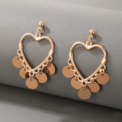 Nihaojewelry wholesale jewelry retro gold hollow heart round piece tassel earrings