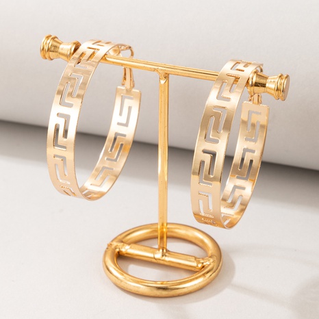 Nihaojewelry wholesale jewelry new simple metal circular hollow pattern earrings's discount tags